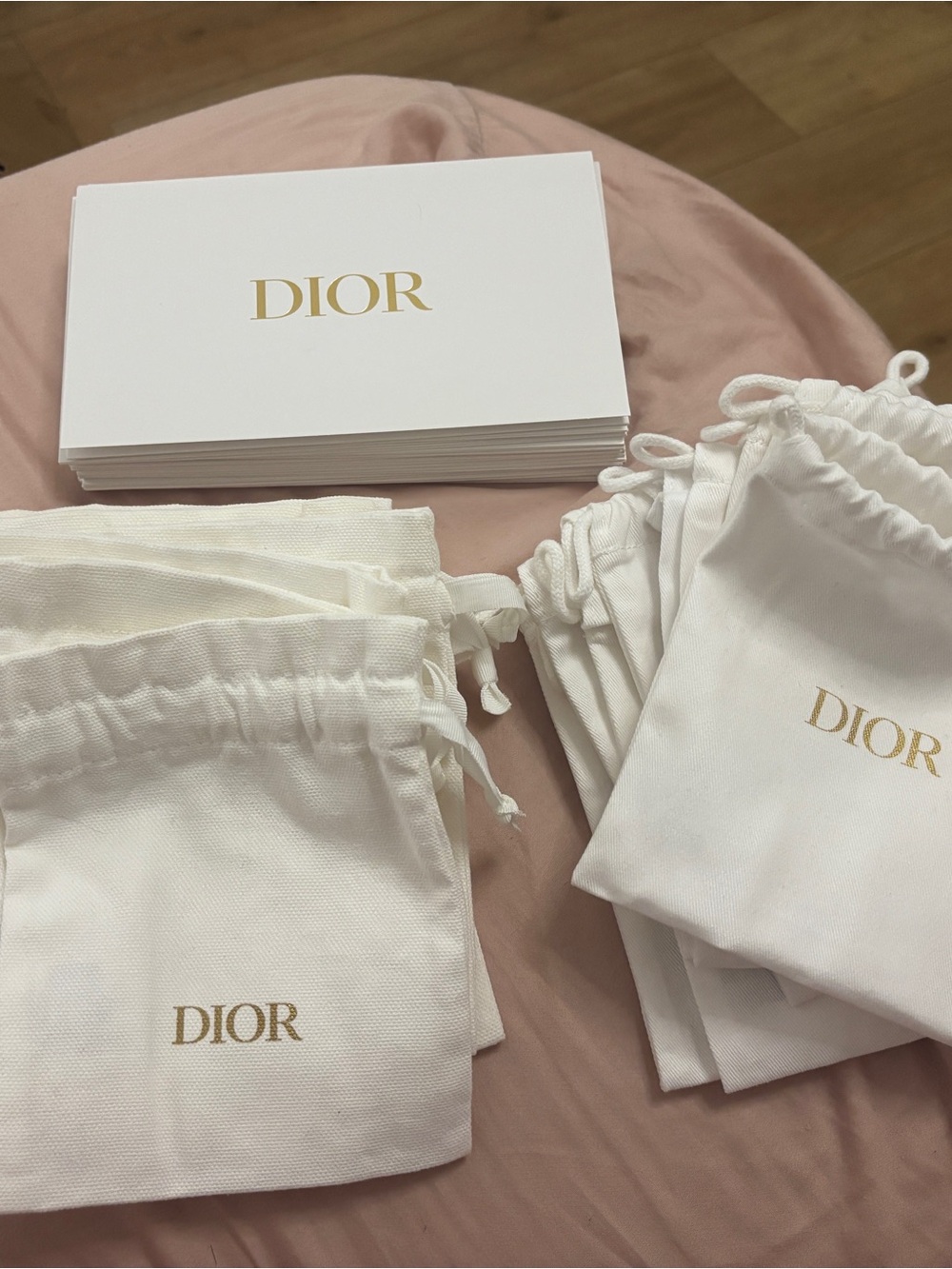 dior envelopes and drawstring pouches